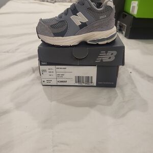 New Balance Kids' Sneakers in Gray and White